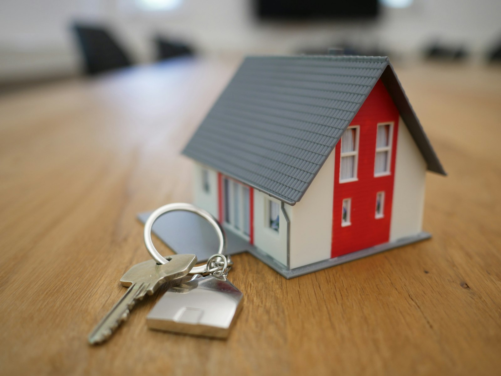 Agent handing keys to new homeowners in Puerto Rico